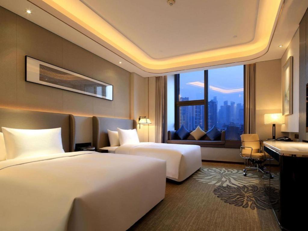 วินด์แฮม แกรนด์ พลาซา รอยัล หัวยู ฉงชิง Hotel ฉงชิ่ง ภายนอก รูปภาพ